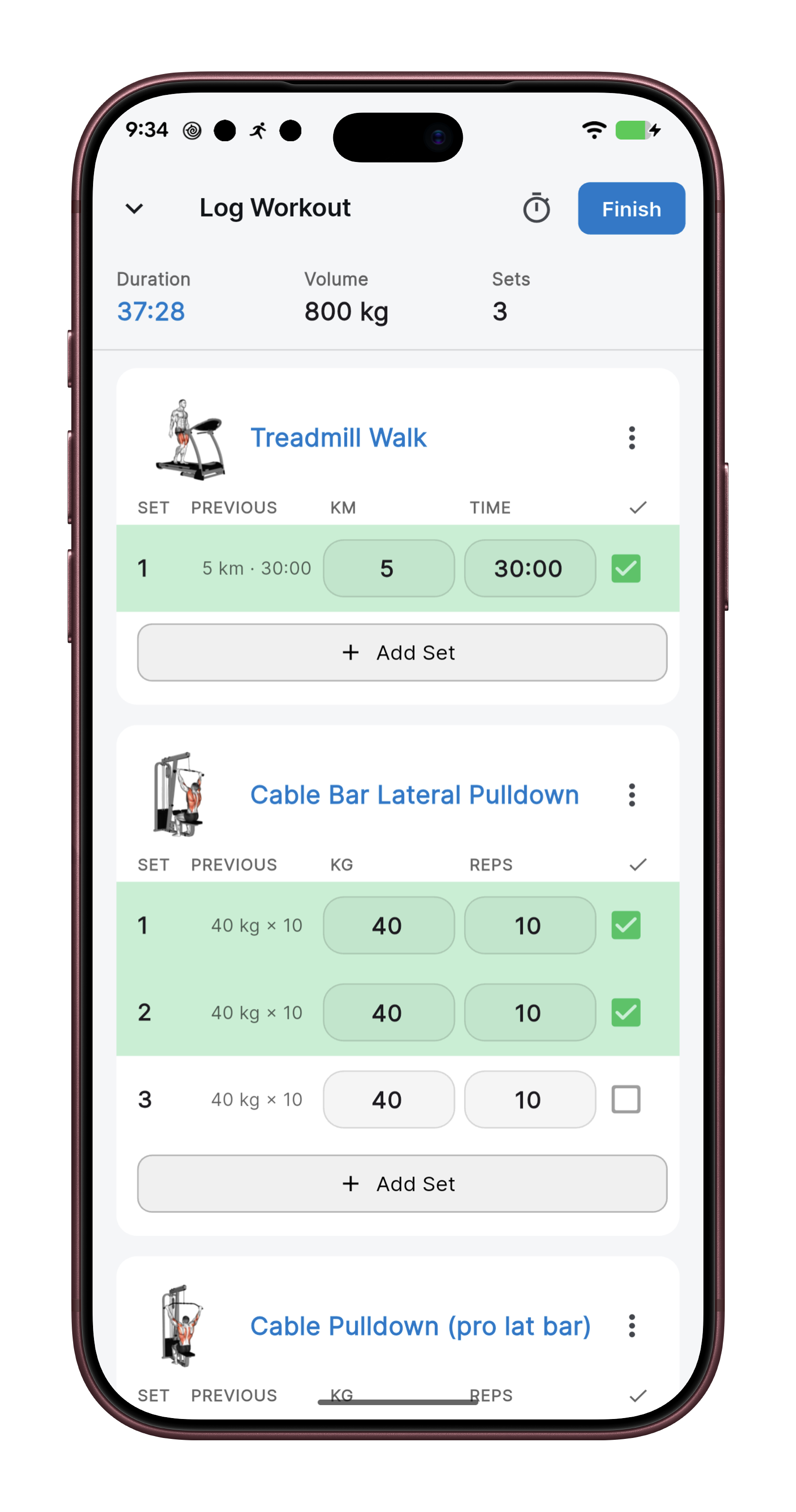 GymAIO workout logging screen with sets, reps and live volume